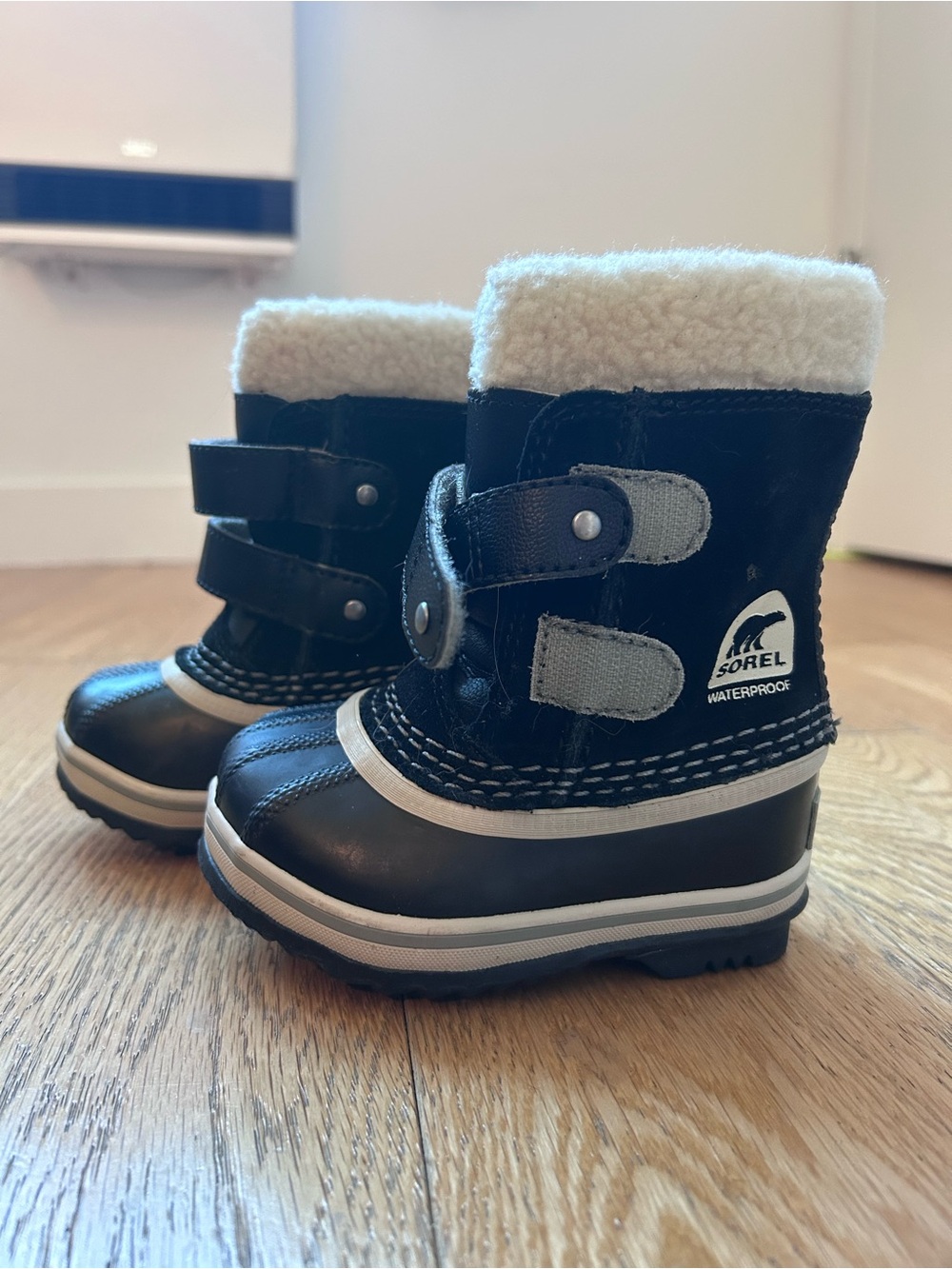 Sorel Kids Black and White Waterproof Winter Boots with Faux Shearling Cuff